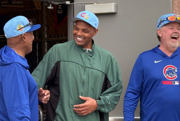 Former NBA All-Star Charles Barkley, center, laughs with Chicago Cubs legends Ferguson Jenkins, left, and Rick Sutcliffe at Cubs spring training camp on Friday, Feb. 13, 2026, in Mesa, Ariz. (Meghan Montemurro/Chicago Tribune)