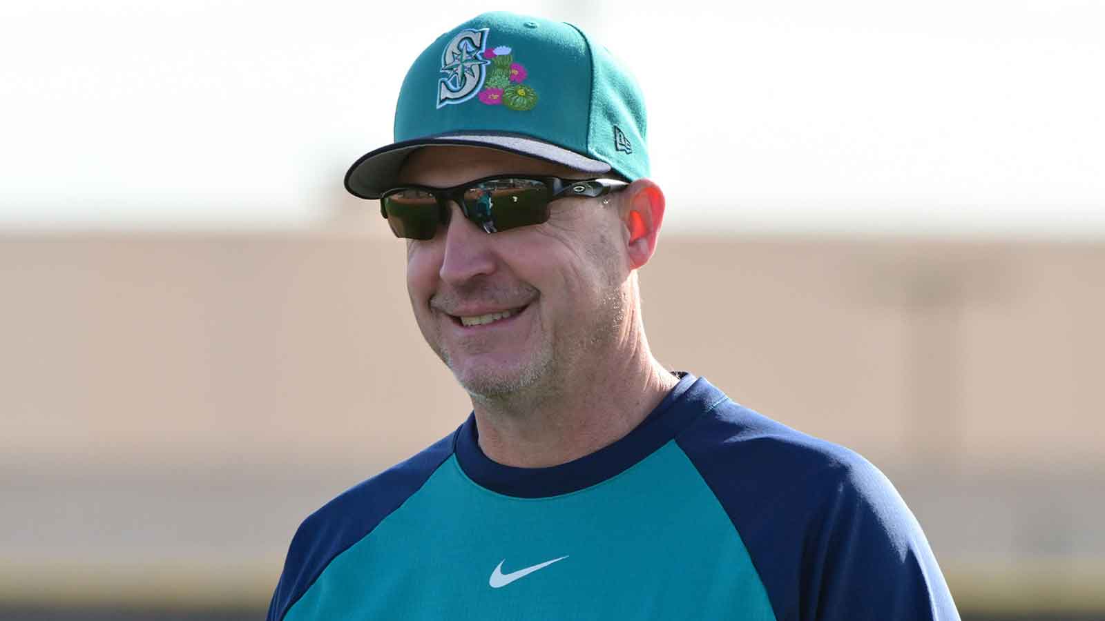 Seattle Mariners manager Dan Wilson (6) looks on during a Spring Training workout at Peoria Sports Complex.