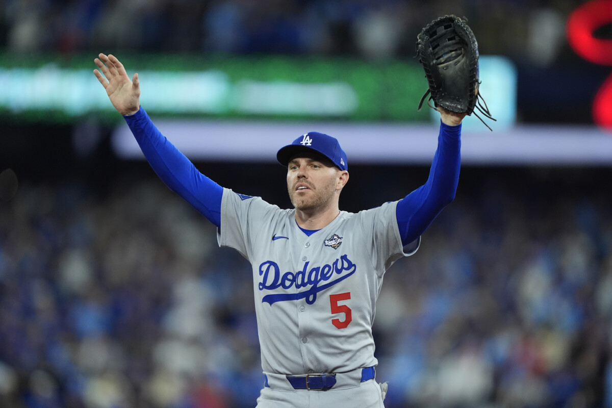 Los Angeles Dodgers first baseman Freddie Freeman (5) reacts after the catch by center fielder Andy Pages (not pictured) in the ninth inning against the Toronto Blue Jays during game seven of the 2025 MLB World Series at Rogers Centre.