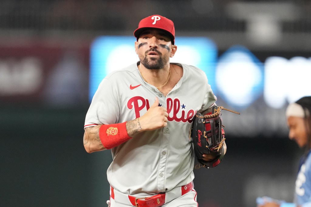 Kyle Schwarber of the Philadelphia Phillies.Nick Castellanos #8 of the Philadelphia Phillies runs back to the dugout out between innings during a baseball game against the Washington Nationals at Nationals Park on August 15, 2025 in Washington, DC. 