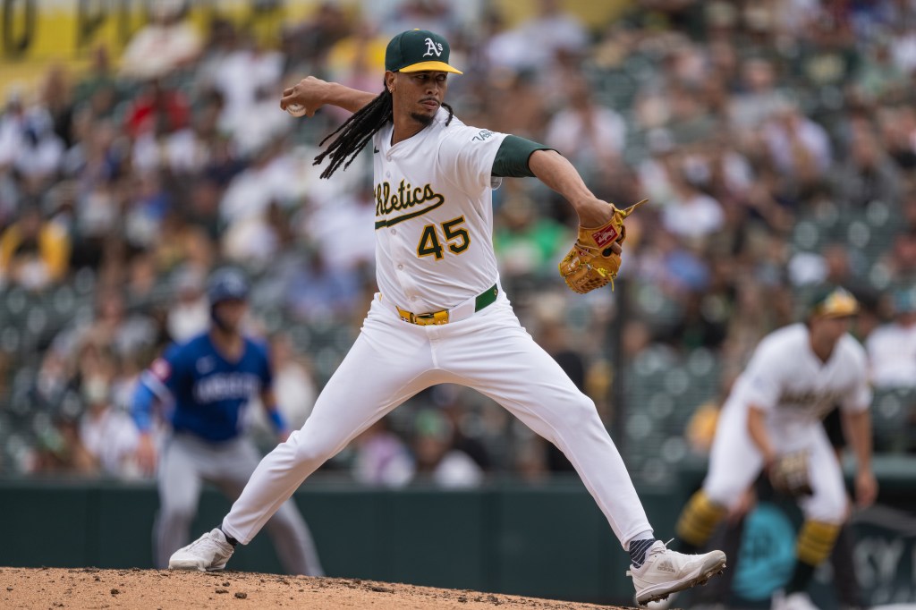 Osvaldo Bido #45 of the Athletics pitches in the top of the seventh inning against the Kansas City Royals at Sutter Health Park on September 28, 2025 in Sacramento, California.