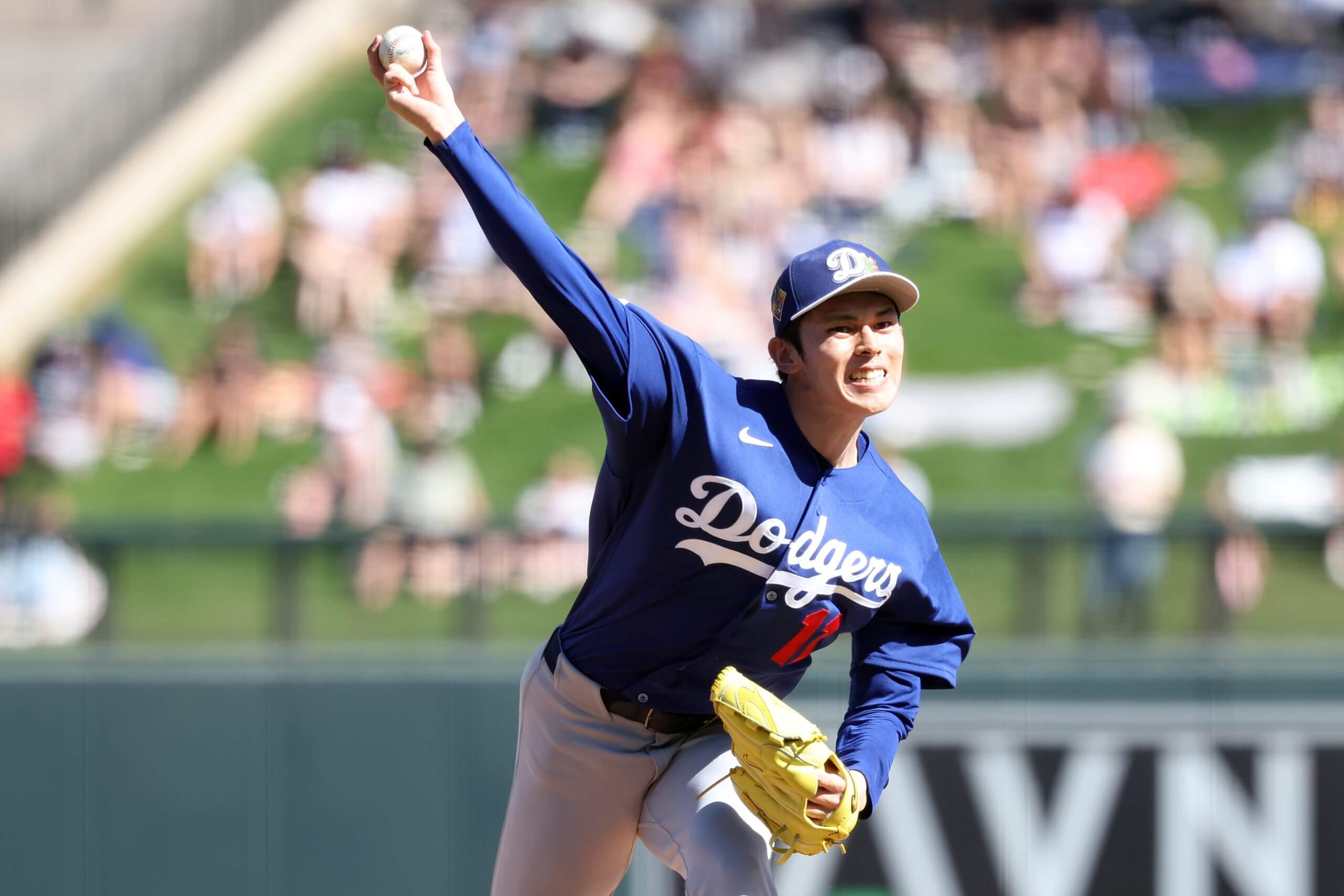 Pitcher Roki Sasaki of the Los Angeles Dodgers throws against the Arizona Diamondbacks during the second inning of a spring training game at Salt River Fields at Talking Stick on February 25, 2026 in Scottsdale, Arizona.