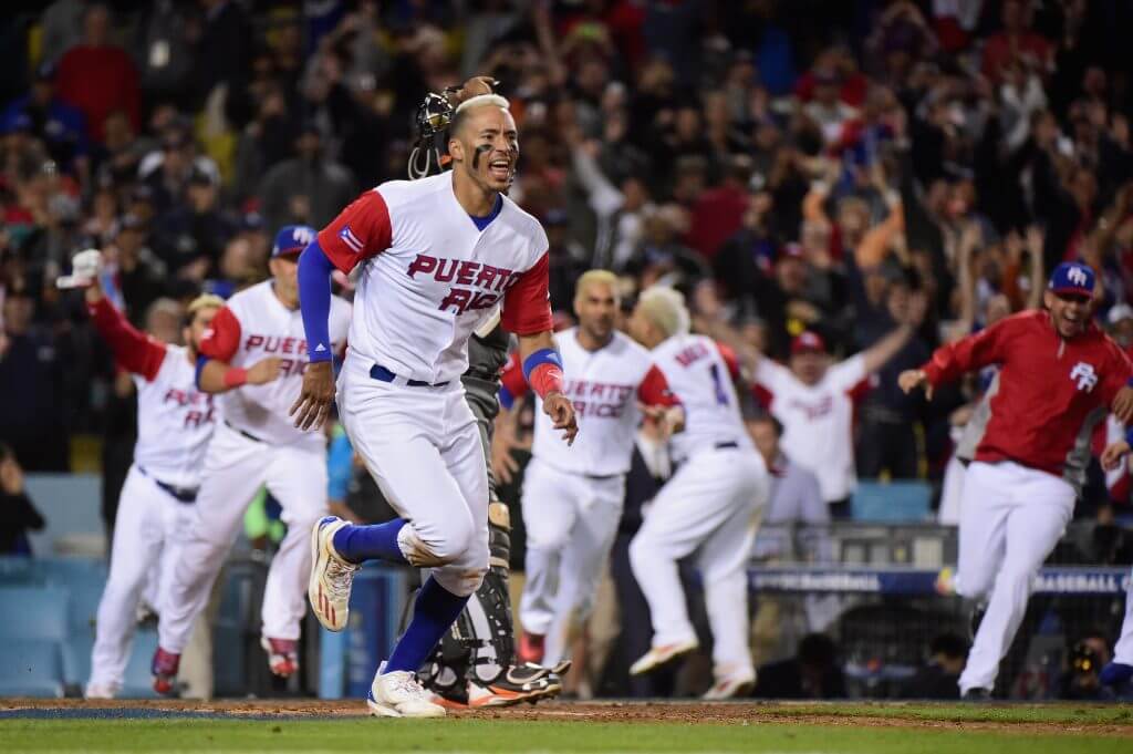 Carlos Correa celebrates.