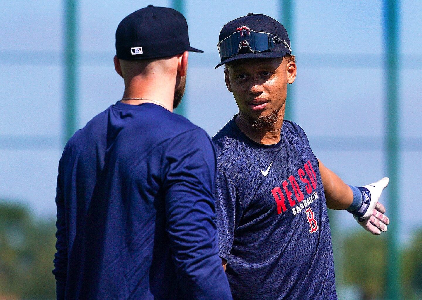 Trevor Story chats with Kristian Campbell (right) on Friday at JetBlue Park.