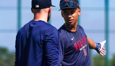Trevor Story chats with Kristian Campbell (right) on Friday at JetBlue Park.