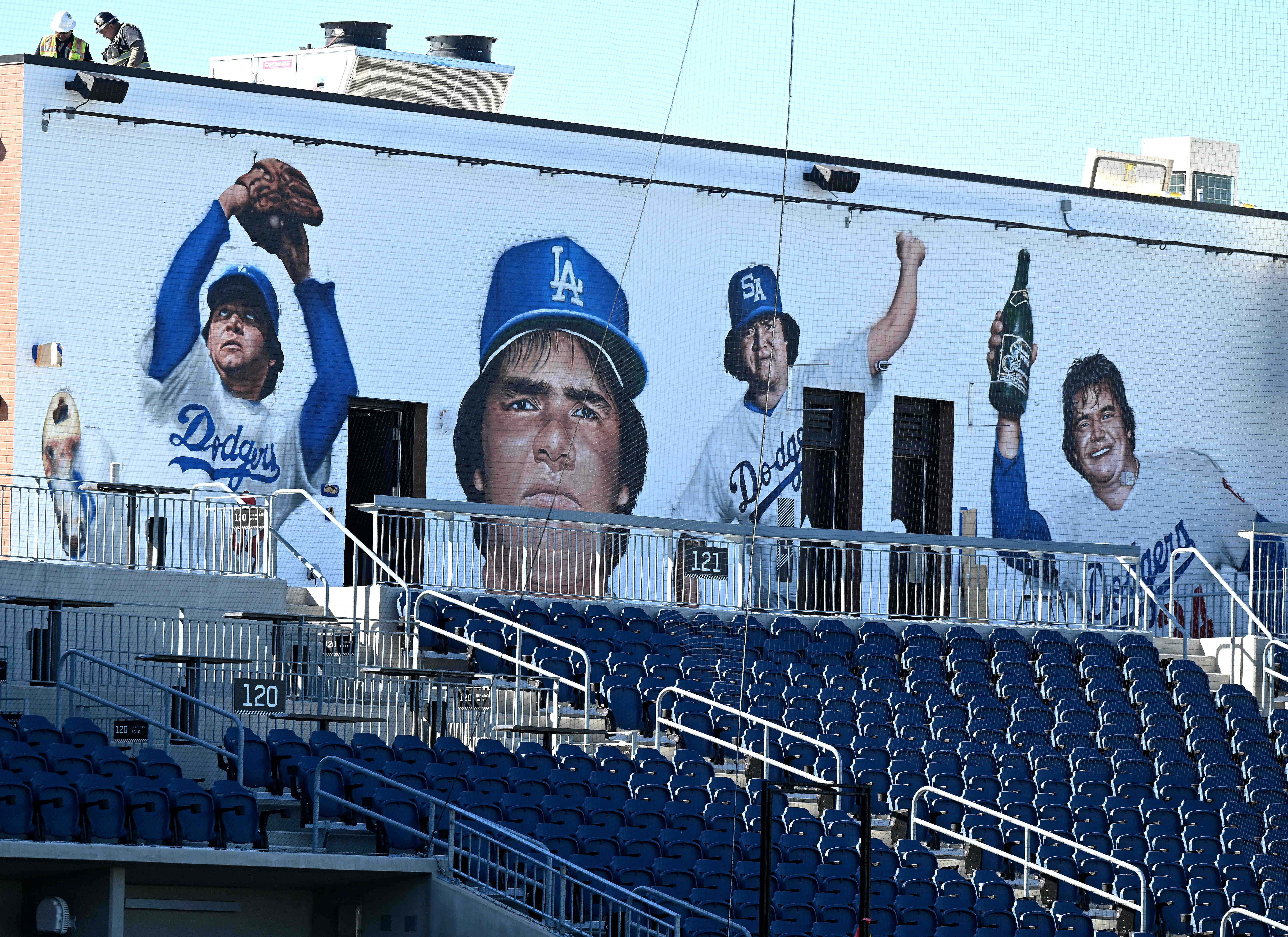 A mural of Dodger legend Fernando Valenzuela is seen Friday,...
