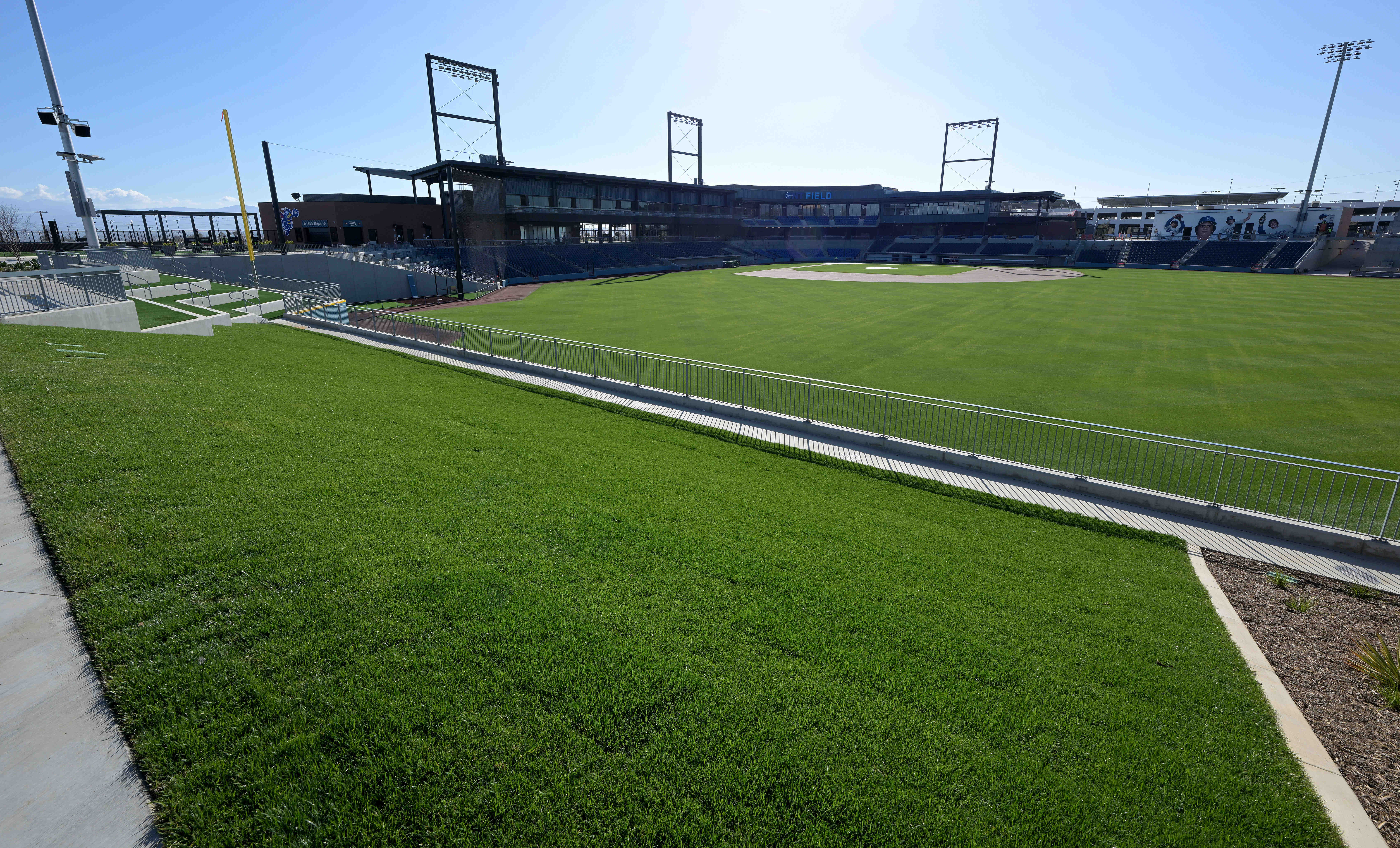 A right field grass seating area at ONT Field in...