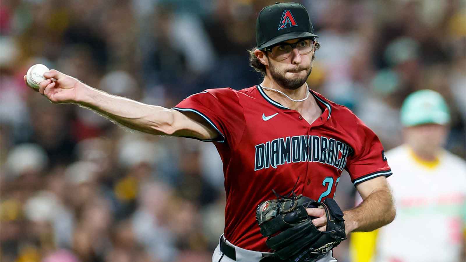 Arizona Diamondbacks starting pitcher Zac Gallen (23) throws to first base for an out during the second inning against the San Diego Padres at Petco Park.