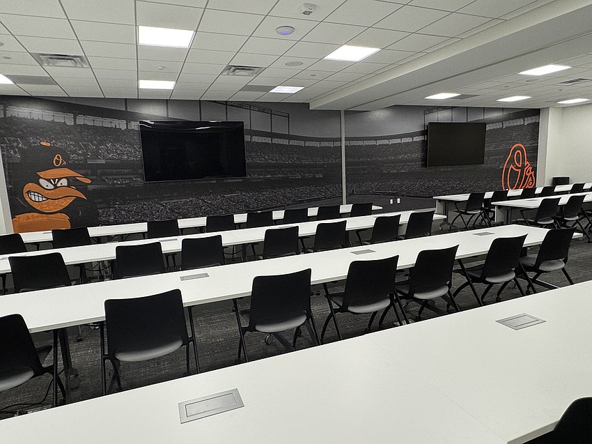 The classroom features a picture of the stadium in the background. The classroom features a picture of the stadium in the background.