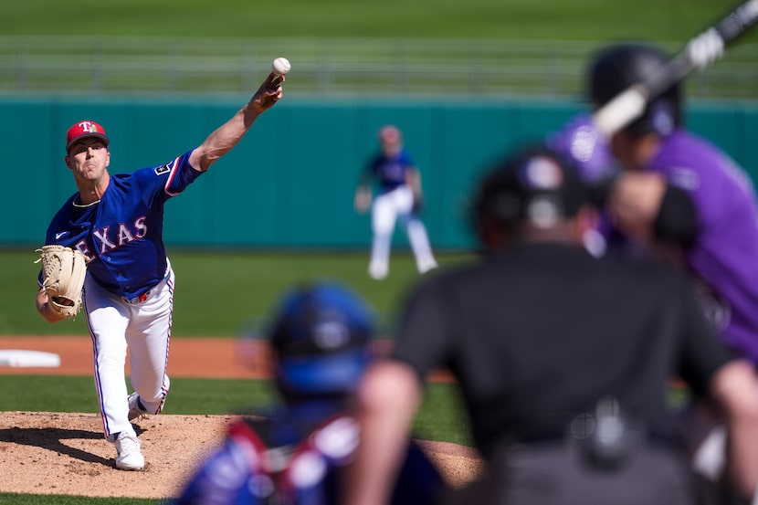 Texas Rangers pitcher MacKenzie Gore delivers during the first inning of a spring training...