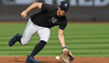 New York Yankees shortstop Anthony Volpe takes ground balls during pregame workouts as manager Aaron Boone continues to back him amid replacement speculation.