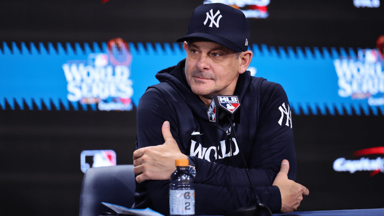 Aaron Boone spoke to reporters at Yankees spring training after responding to a former player’s playoff comments.