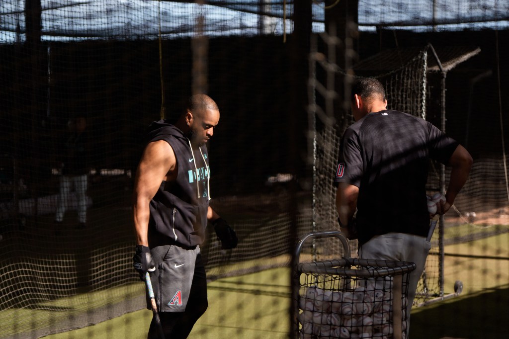 Arizona Diamondbacks infielder Carlos Slamtana Santana (41) inside the batting nets during workouts at Salt River Fields at Talking Stick. 