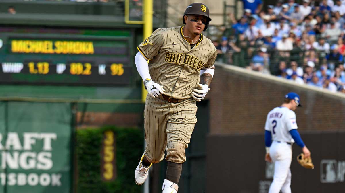 San Diego infielder Manny Machado (13) rounds the bases after hitting a two-run home run in the fifth inning against the Chicago Cubs during game two of the Wildcard round for the 2025 MLB playoffs at Wrigley Field.