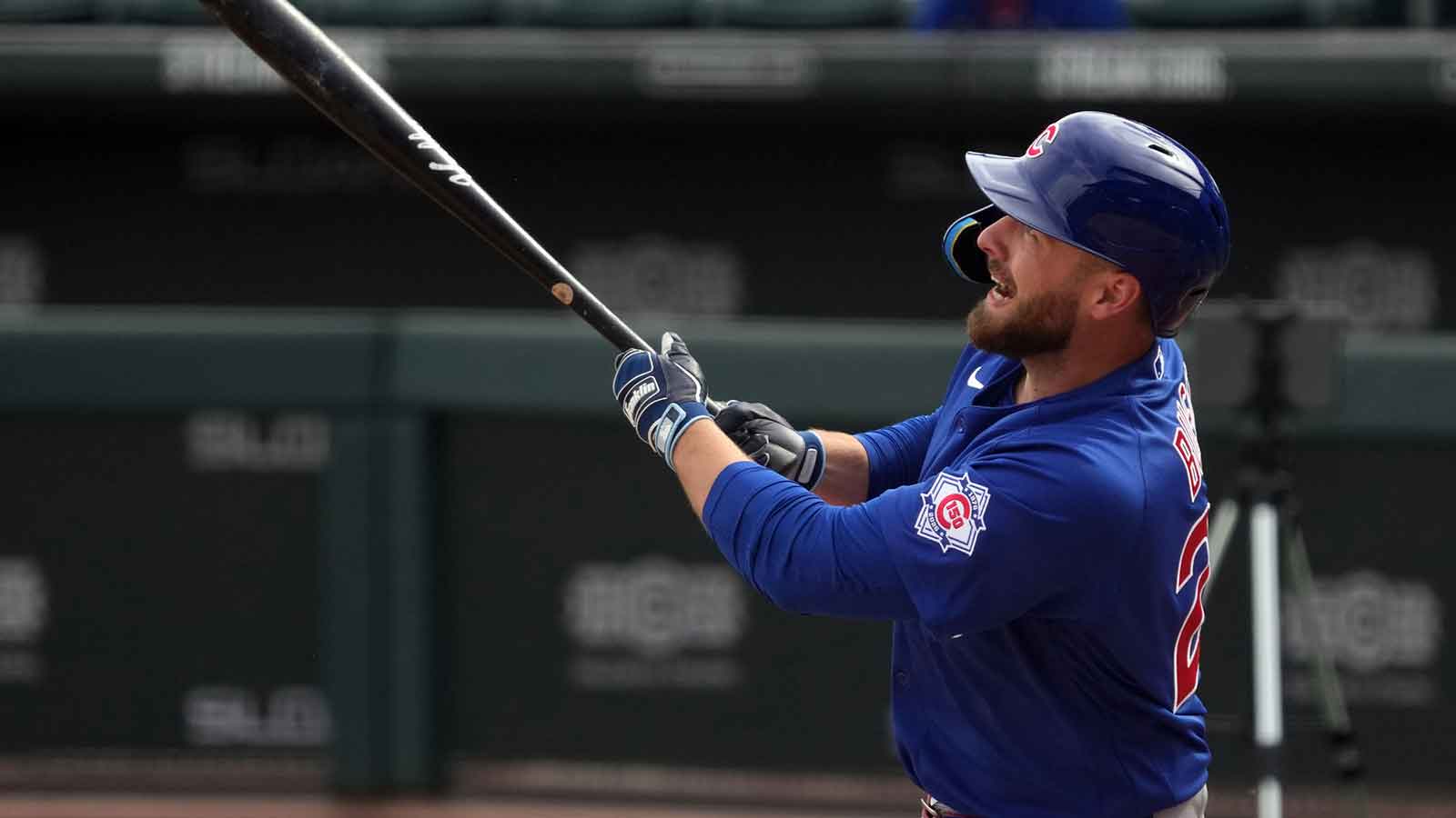 Chicago Cubs first baseman Michael Busch (29) hits live batting practice during spring training camp at Sloan Park.