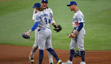 Los Angeles Dodgers veterans Kiké Hernandez and Miguel Rojas celebrating during the 2025 World Series.