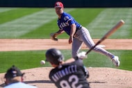 Chicago White Sox second baseman Sam Antonacci hits a grounder back to Texas Rangers pitcher...