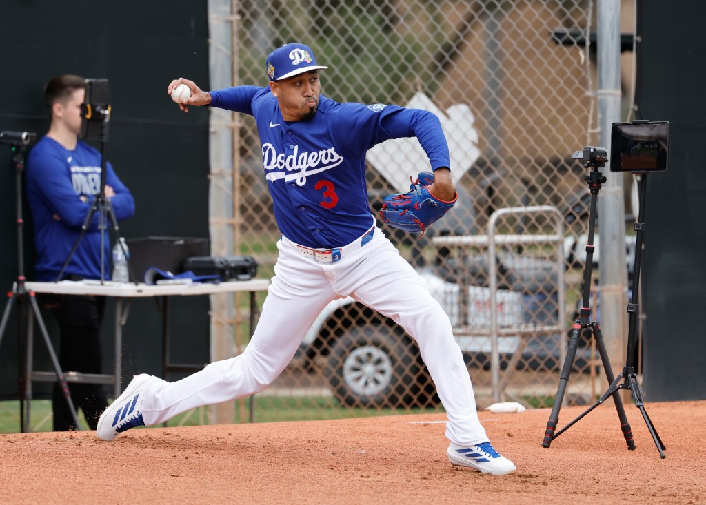Dodgers closer Edwin Diaz delivers during a spring training workout.