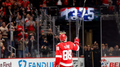 Jan 29, 2026; Detroit, Michigan, USA; Detroit Red Wings right wing Patrick Kane (88) celebrates after he gets his 1375 point in the second period against the Washington Capitals at Little Caesars Arena.