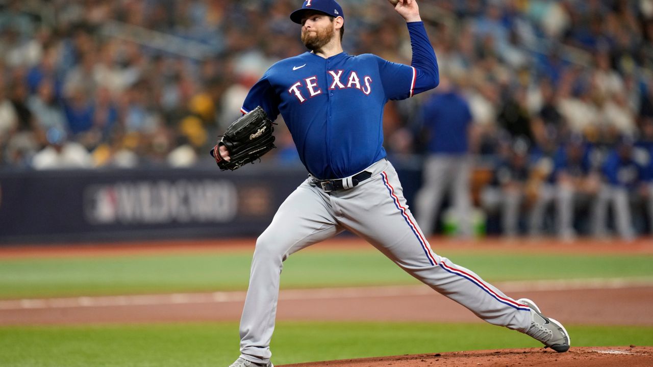 Texas Rangers starting pitcher Jordan Montgomery throws against the Tampa Bay Rays during the first inning of Game 1 in an AL wild-card baseball playoff series game, Tuesday, Oct. 3, 2023, in St. Petersburg, Fla. (AP Photo/John Raoux)
