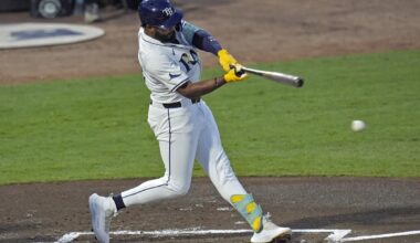 Tampa Bay Rays' Junior Caminero lines an RBI single off Seattle Mariners pitcher Bryan Woo during the first inning of a baseball game Tuesday, Sept. 2, 2025, in Tampa, Fla. (AP Photo/Chris O'Meara)