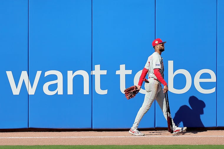 Philadelphia Phillies Justin Crawford walks back to the clubhouse after exiting the spring training game against the Toronto Blue Jays.