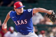 Texas Rangers pitcher Gavin Collyer delivers during the fifth inning of a spring training...
