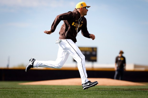 Nick Castellanos of the San Diego Padres runs the bases during spring training workouts at the Peoria Sports Complex on Sunday, Feb. 15, 2026 in Peoria, Ariz.(Meg McLaughlin / The San Diego Union-Tribune)