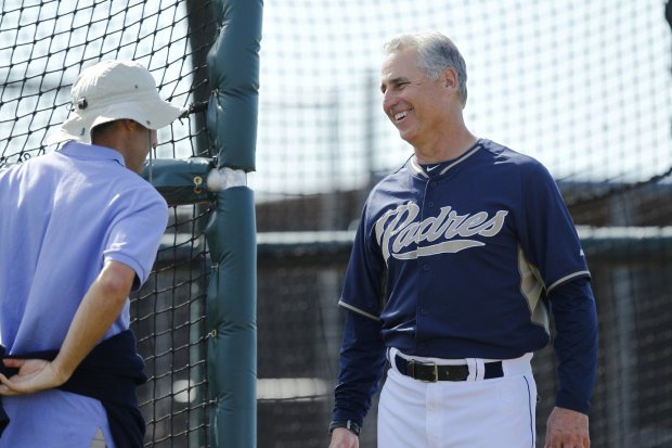 Padres general manager A. J. Preller and manager Bud Black talk before batting practice during a spring training practice. (K.C. Alfred, The San Diego Union-Tribune)