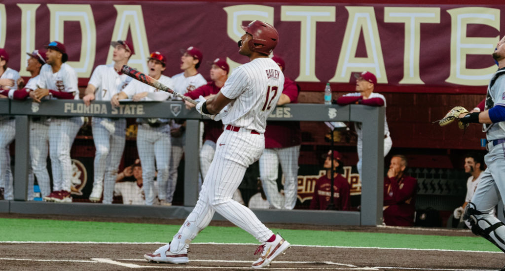 Florida State first baseman Myles Bailey watches his first home run of the 2026 season sail over the fence in right-center field. (Courtesy of FSU Sports Information)