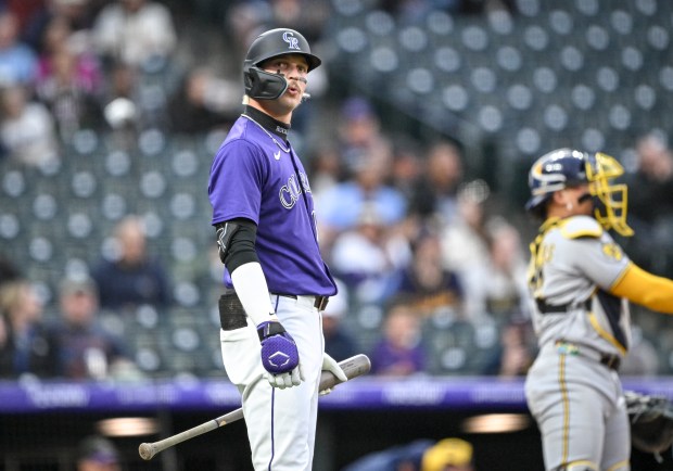 Zac Veen (13) of the Colorado Rockies takes in the moemnt before his first Major League at-bat against Freddy Peralta (51) of the Milwaukee Brewers during the second inning at Coors Field in Denver on Tuesday, April 8, 2025. (Photo by AAron Ontiveroz/The Denver Post)