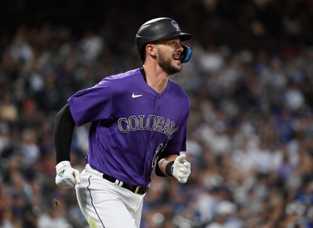 Colorado Rockies left fielder Kris Bryant ...