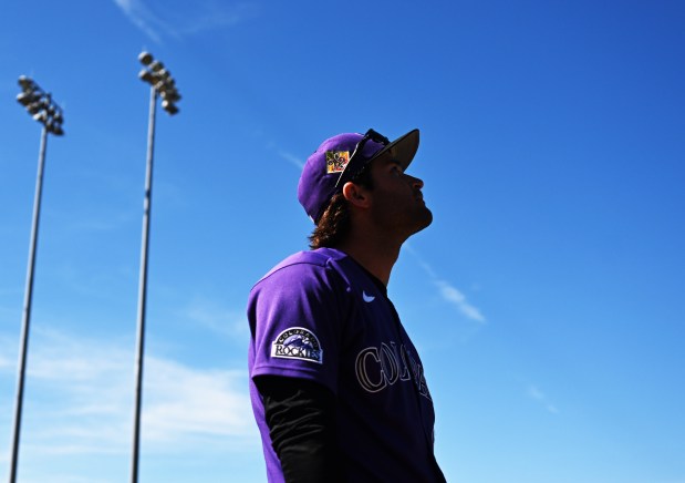 SCOTTSDALE, AZ - FEBRUARY 19: Infielder, Kyle Karros, watches a teammates ball travel out of the park during batting practice at spring training for the Colorado Rockies at Salt River Field at Talking Stick in Scottsdale, Arizona on February 19, 2026. (Photo by RJ Sangosti/The Denver Post)