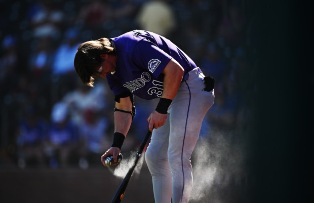 SURPRISE, AZ - FEBRUARY 22: Outfielder Jake McCarthy gets his bat ready for game three of the 2026 Colorado Rockies spring training at Surprise Stadium in Surprise, Arizona on February 22, 2026. The Colorado Rockies took on the Texas Rangers. (Photo by RJ Sangosti/The Denver Post)