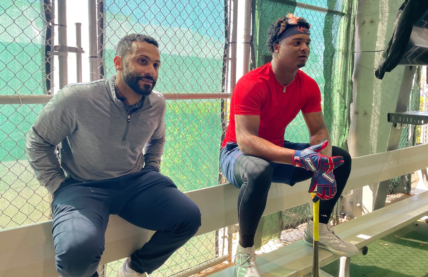 Red Sox player development manager Justin Frometa (left) and player Justin Gonzales at the team's facility.