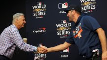 Oct 27, 2022; Houston, TX, USA; World Series game one Houston Astros starting pitcher Justin Verlander (35) shakes hands with Dave Dombrowski before answering questions from the press at Minute Maid Park. Mandatory Credit: Thomas Shea-USA TODAY Sports