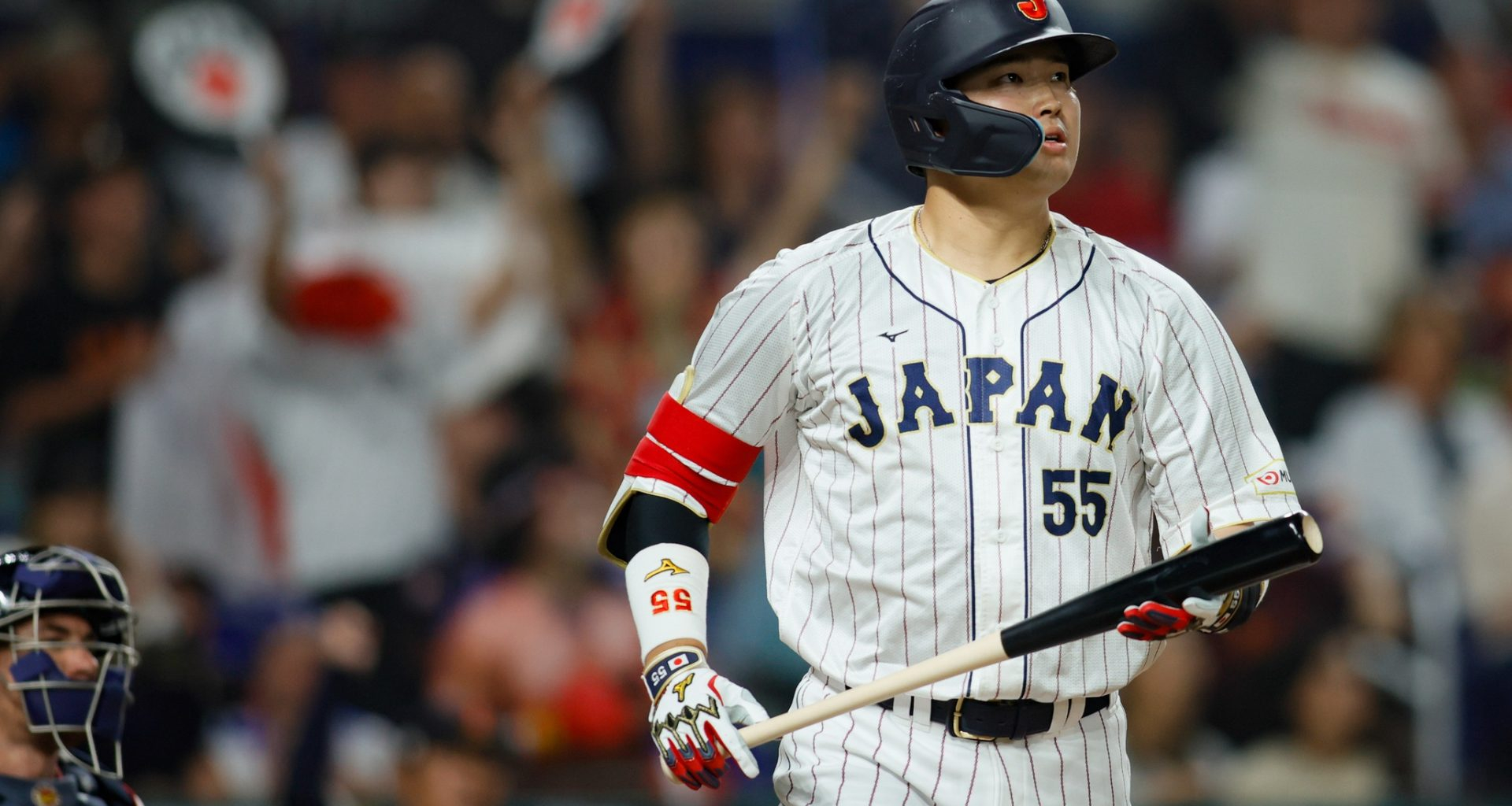 Mar 21, 2023; Miami, Florida, USA; Japan third baseman Munetaka Murakami (55) looks on after hitting a home run during the second inning against USA at LoanDepot Park.