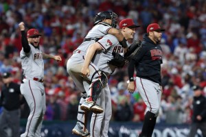 Oct 24, 2023; Philadelphia, Pennsylvania, USA; Arizona Diamondbacks relief pitcher Paul Sewald (38) reacts with catcher Gabriel Moreno (14) after defeating the Philadelphia Phillies in game seven of the NLCS for the 2023 MLB playoffs at Citizens Bank Park. Mandatory Credit: Bill Streicher-USA TODAY Sports