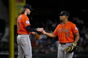 Josh Hader (left) is out for the rest of the regular season with a shoulder injury.