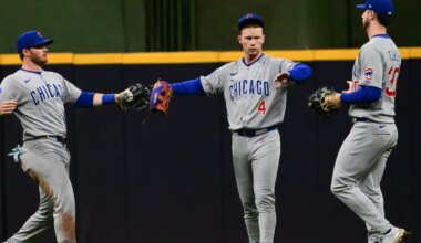 Chicago Cubs left fielder Ian Happ (8), center fielder Pete Crow-Armstrong (4) and right fielder Kyle Tucker (30) celebrate after beating the Milwaukee Brewers at American Family Field.