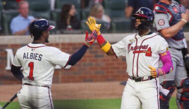 Sep 22, 2025; Atlanta, Georgia, USA; Atlanta Braves right fielder Ronald Acuna Jr. (13) celebrates with second baseman Ozzie Albies (1) after a home run against the Washington Nationals in the first inning at Truist Park.