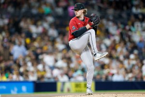 Sep 26, 2025; San Diego, California, USA; Arizona Diamondbacks relief pitcher Andrew Saalfrank (27) throws a pitch during the seventh inning against the San Diego Padres at Petco Park. Mandatory Credit: David Frerker-Imagn Images