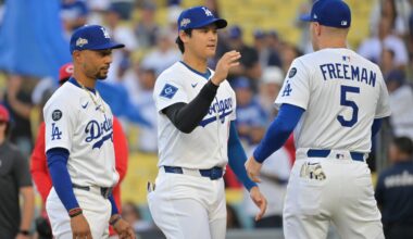 Sep 30, 2025; Los Angeles, California, USA; Los Angeles Dodgers designated hitter Shohei Ohtani (17) greets Los Angeles Dodgers first baseman Freddie Freeman (5) before the game against the Cincinnati Reds during game one of the Wildcard round for the 2025 MLB playoffs at Dodger Stadium.