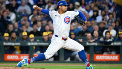 Oct 8, 2025; Chicago, Illinois, USA; Chicago Cubs pitcher Daniel Palencia (48) throws a pitch against the Milwaukee Brewers in the sixth inning during game three of the NLDS round for the 2025 MLB playoffs at Wrigley Field.