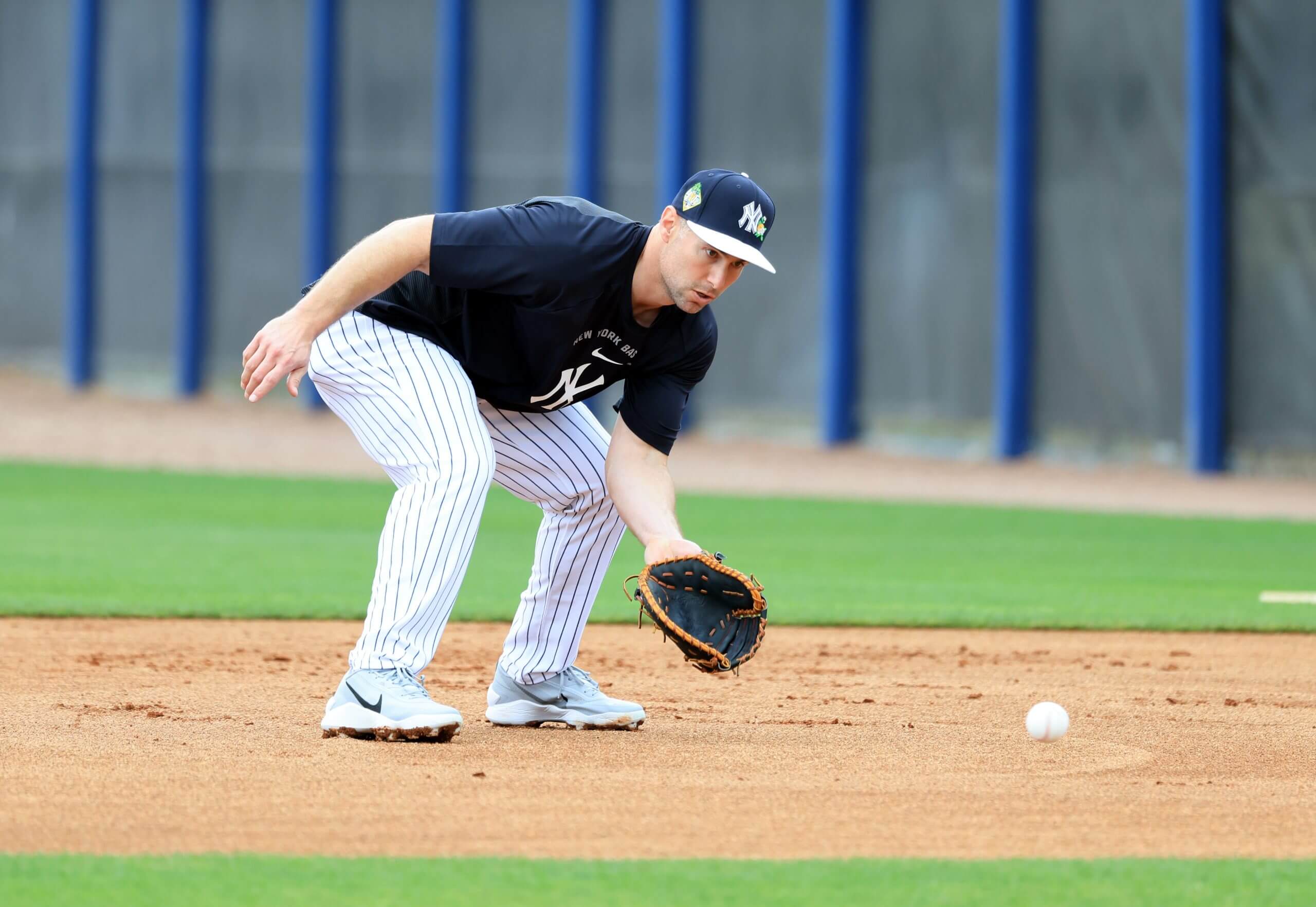 Paul Goldschmidt bends over with his glove ready to field a grounder rolling toward him Thursday at George M. Steinbrenner Field.