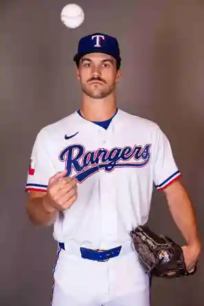 Feb 17, 2026; Surprise, AZ, USA; Texas Rangers pitcher Carter Baumler during media day at Surprise Sports Complex. Mandatory Credit: Arianna Grainey-Imagn Images