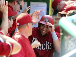 Sep 6, 2015; Chicago, IL, USA; Arizona Diamondbacks left fielder David Peralta (6) celebrates scoring a run during the fourth inning against the Chicago Cubs at Wrigley Field. Mandatory Credit: Dennis Wierzbicki-USA TODAY Sports