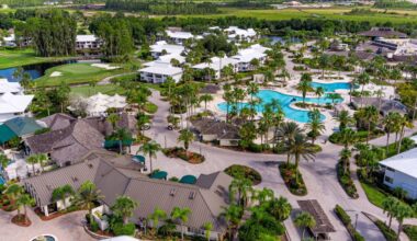 Aerial view of Saddlebrook Resort in Wesley Chapel, showing pools, golf course and resort buildings.