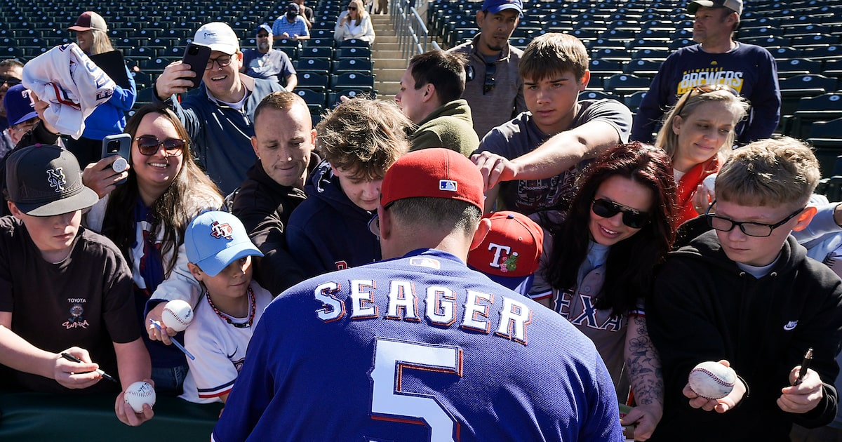 Play ball! See photos from the Texas Rangers' Cactus League opener against the Kansas City Royals