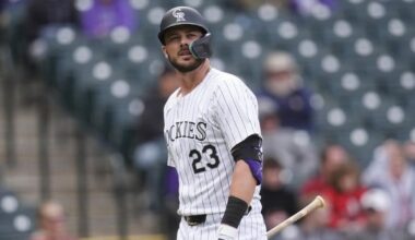 Colorado Rockies third baseman Kris Bryant (back) not retiring, committed to rehab
